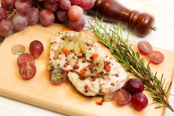 pork fillet with red grapes and goji berries