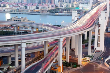 Foto op Plexiglas Nanpubrug Nanpu-brug in de schemering. Shanghai, China