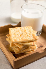 Fototapeta na wymiar Crackers in wooden box and milk