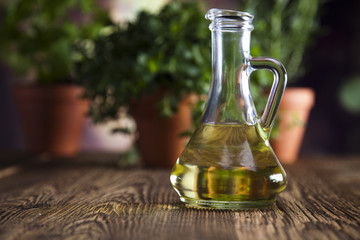 Flagon with olive oil, herbs