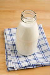 Bottle of milk on the fabric