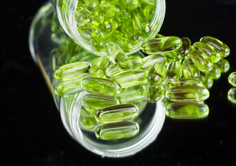 Natural omega-3, Omega-6 gel on black background