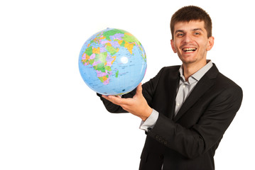 Laughing businessman hold world globe