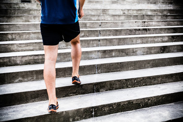 Man running on stairs, jogger