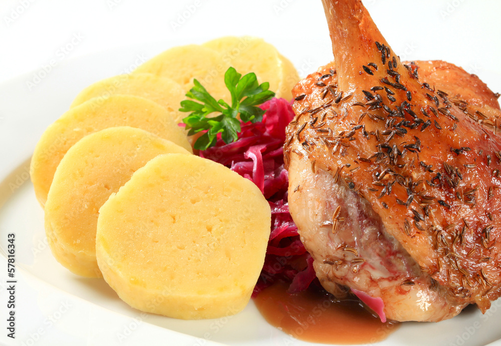 Sticker Roast duck with potato dumplings and red cabbage