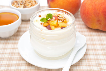 homemade yogurt with honey, peaches and nuts