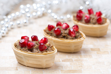 tartlets with liver pate and pomegranate seeds