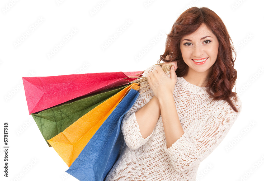 Wall mural Pretty woman with shopping bags