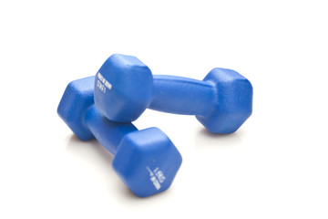 Pair small blue dumbbells isolated on white background