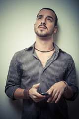 young stylish man on the phone