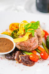 Beefsteak and vegetables.