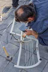 Man welding a chair 3