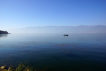 People fishing on Erhail lake, Dali, Yunnan province, China