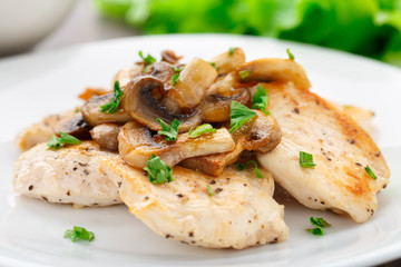 Fried chicken fillet with mushrooms - 57828723