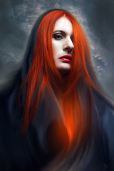 gothic woman in dark hood.