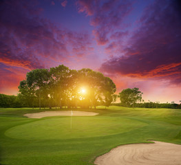 Sunset over a field of golf