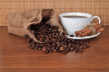 A mug of coffee on a bamboo background