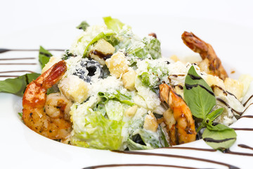 Caesar salad on the table in a restaurant