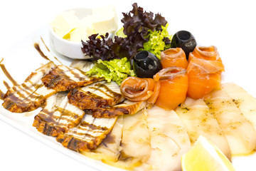 cutting of the fish on the table in a restaurant