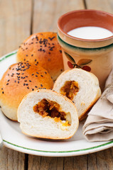 Bread Rolls Filled with Pumpkin and Feta with a Cup of Milk