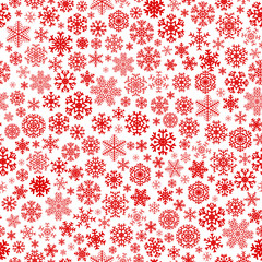 Christmas seamless pattern of small red snowflakes