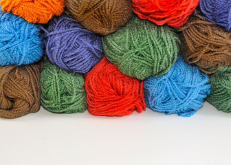 Multi-colored skeins of yarn for knitting .