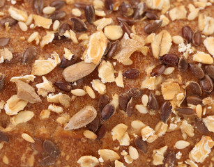 Background of bread with oat flakes