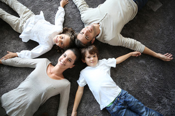 Upper view of happy family of four