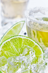 gold tequila with salt and lime