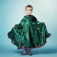 cute little girl with christmas tree dress