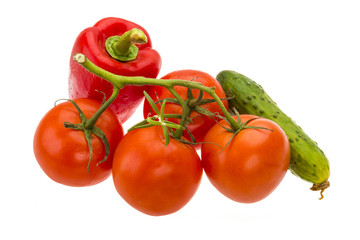 Red pepper, tomato branch and cucumber