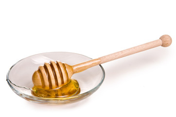 honey is dripping from the spoon