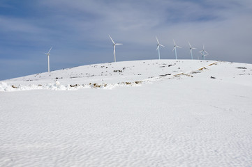 Wind turbines farm in winter (Basque Country)