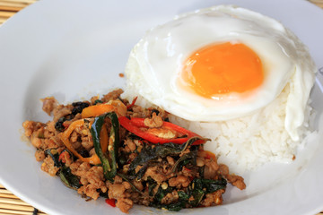 Pad Krapao Moo, spicy stir-fried pork with Thai Holy basil and c