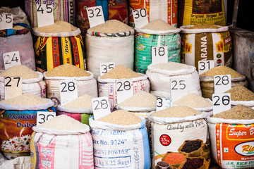 Close-up of bags of cereals and spices in a local country fair