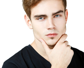 Fototapeta premium Young man handsome face closeup, sexy guy looking at camera over