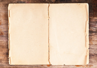 Paper on old wooden background