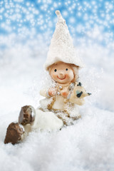 Christmas fun decorative figurines on a snowy background