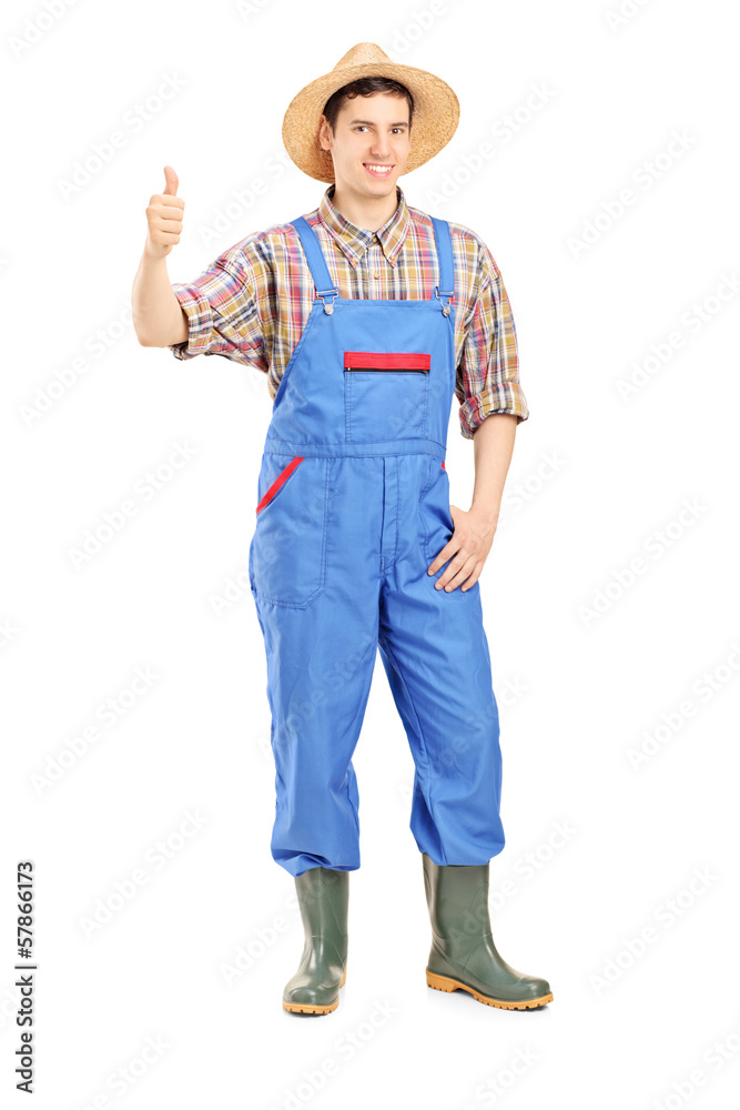 Canvas Prints Young smiling farmer giving a thumb up