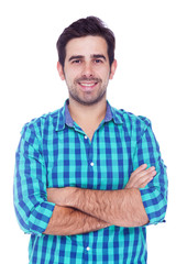 Portrait of a handsome latin man smiling, isolated over a white