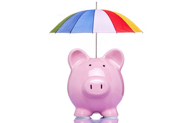 Piggy bank with a multicolored umbrella