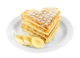 Sweet Belgium waffles with banana, isolated on white