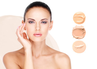 Model face of beautiful woman with foundation on skin
