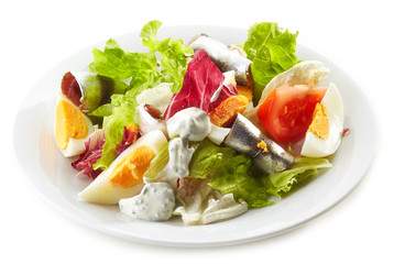 fresh salad with eggs and anchovies