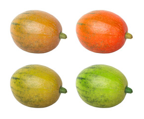 four pumpkins on white background