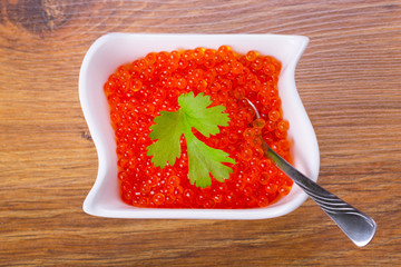 Red salmon caviar in the bowl