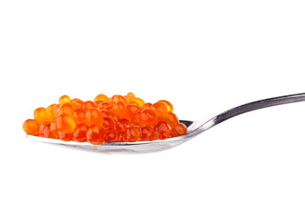 Red caviar in metal spoon isolated on white background