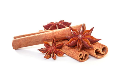 Anise stars and cinnamon on a white background