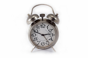 Old silver alarm clock