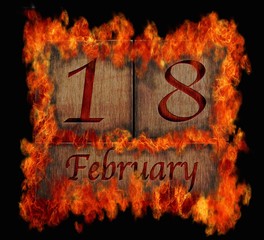 Burning wooden calendar February 18.